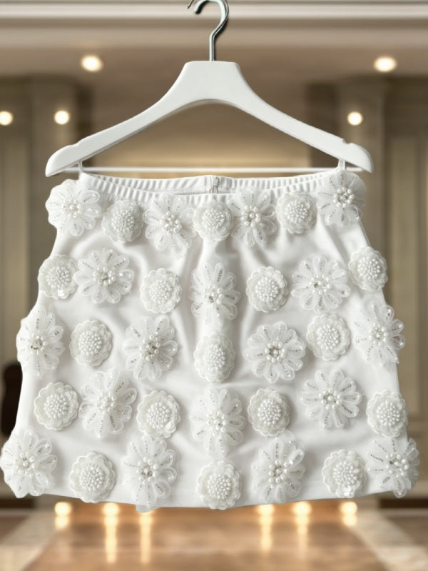 3D Floral Beaded Mini Skirt in White hanging view · nz-bg-v1