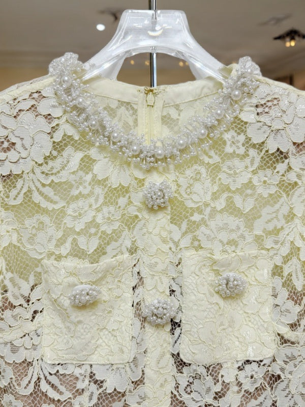 Ivory Lace Peplum Top and Maxi Skirt Set detail view · nz-bg-v1