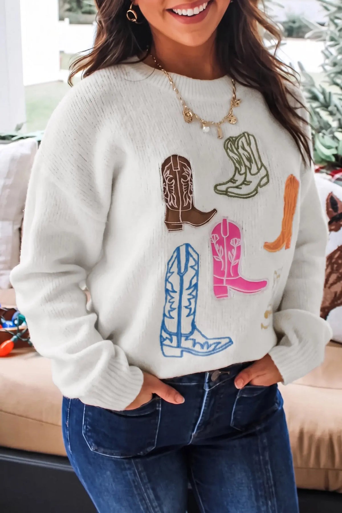 White western boots embroidered graphic drop shoulder pullover sweater, model front view · nz-alt-v1