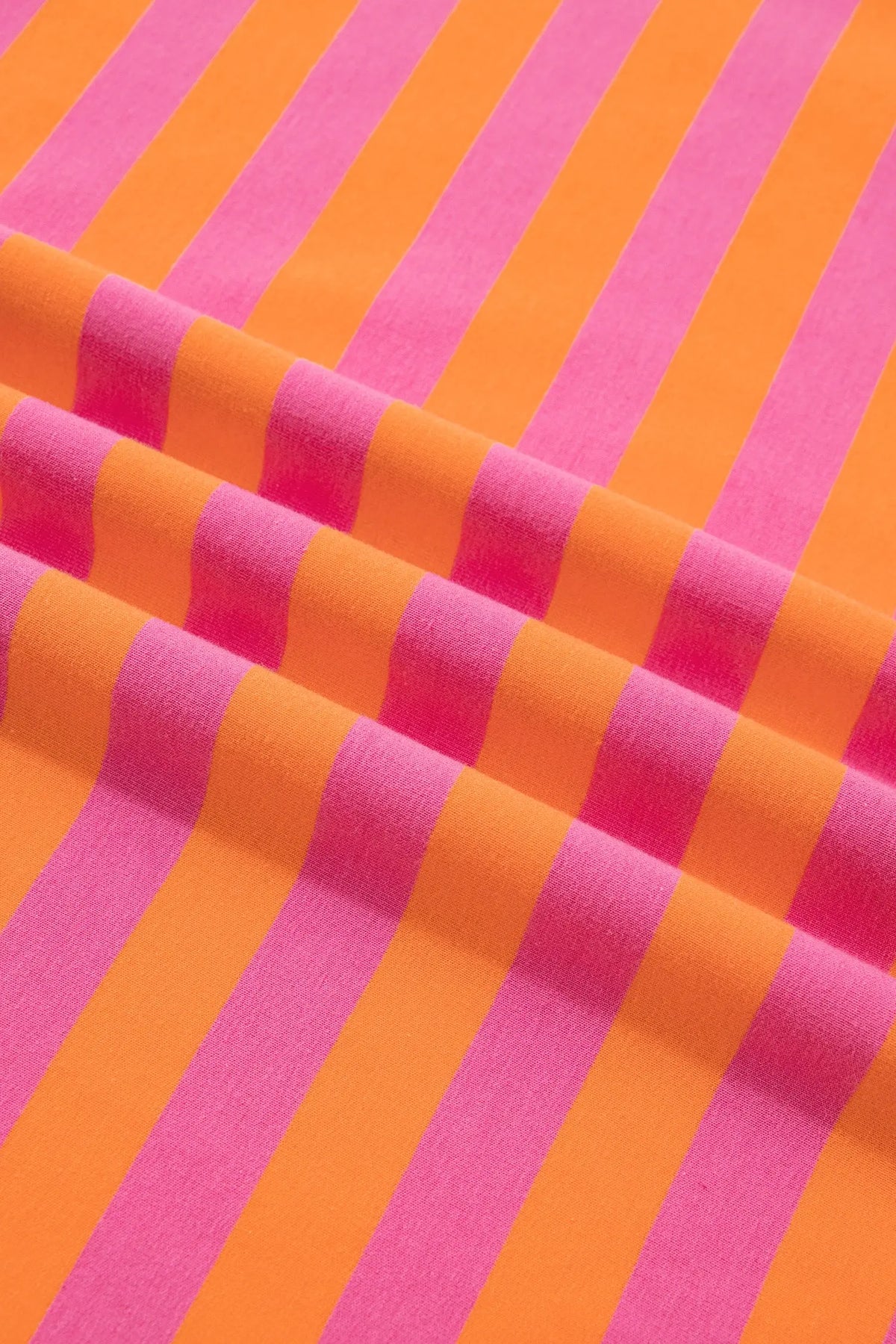 Orange stripe color block patchwork mock neck pullover drawstring mini skort set detail view · nz-alt-v1