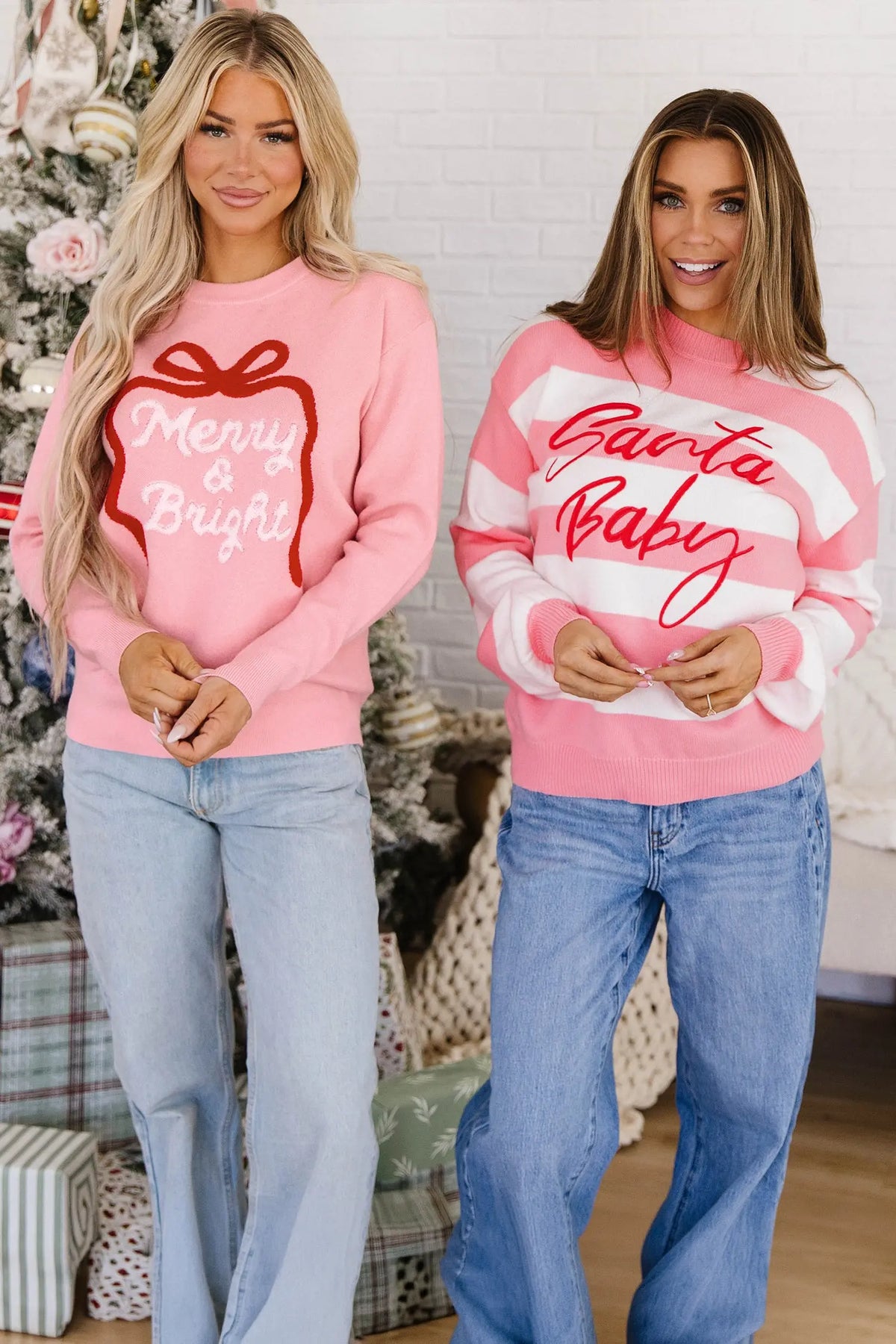 Pink stripe Santa Baby embroidered Christmas pullover sweater model front view · nz-alt-v1