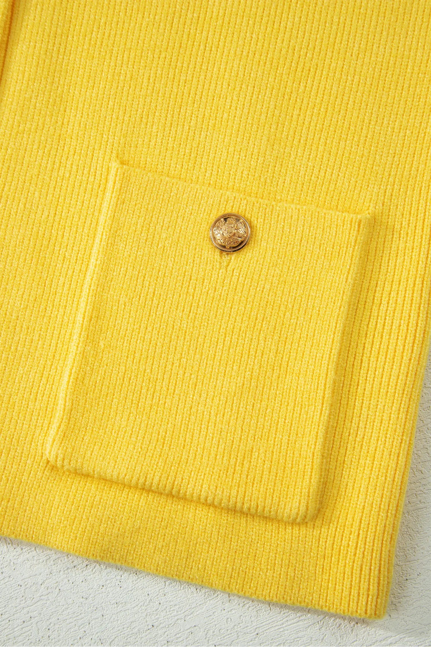 White Solid Color Sleeveless Knit Button Pocketed Sweater Nataliz
