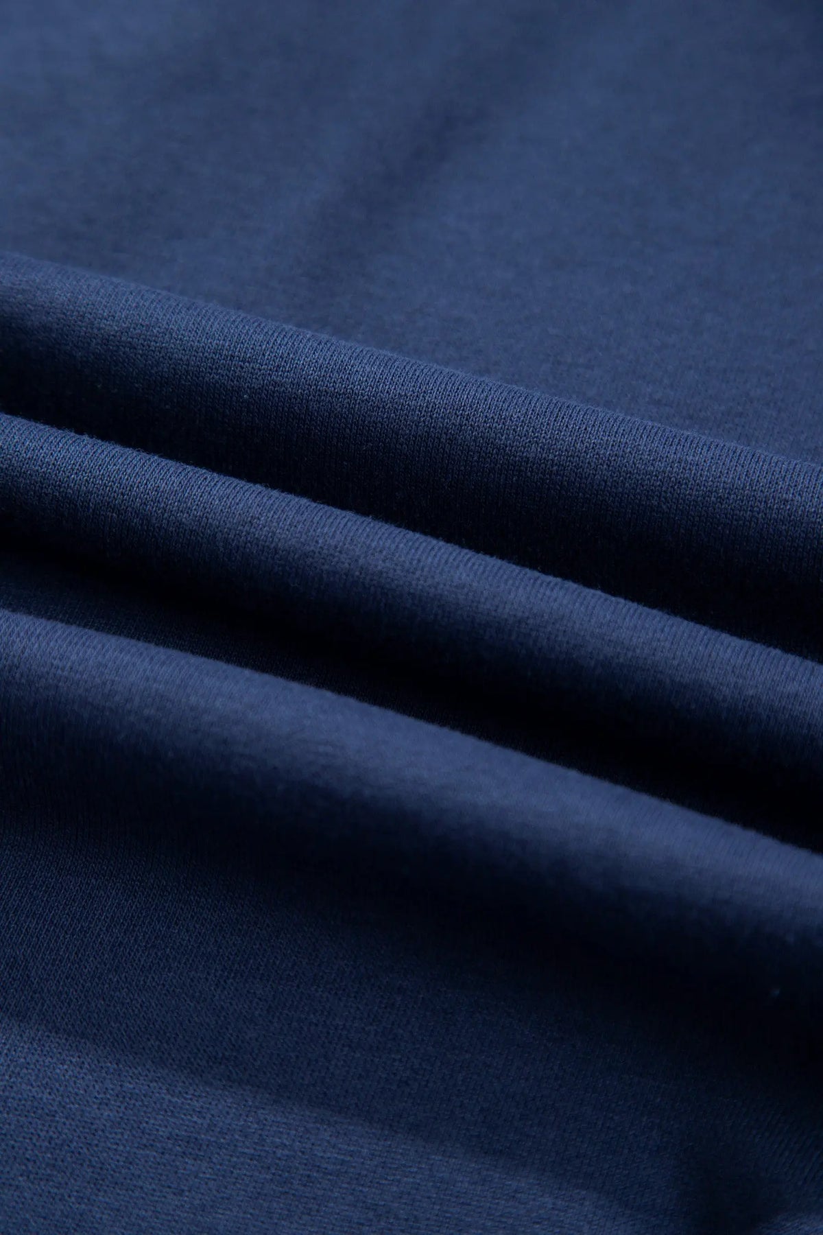 Navy blue long sleeve zip-up top elastic waist skort set detail view · nz-alt-v1
