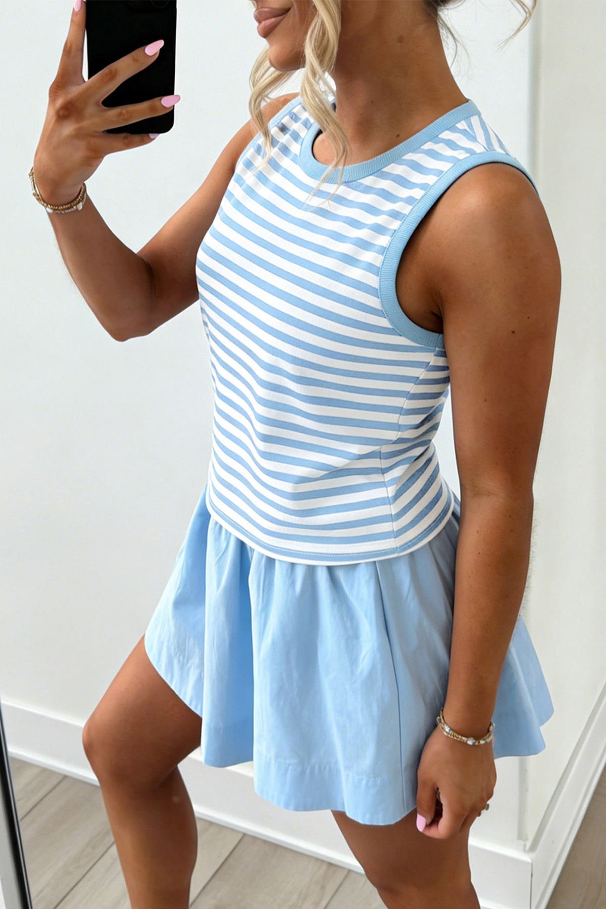 Sky blue stripe slim tank and ruffle mini skort set model side view