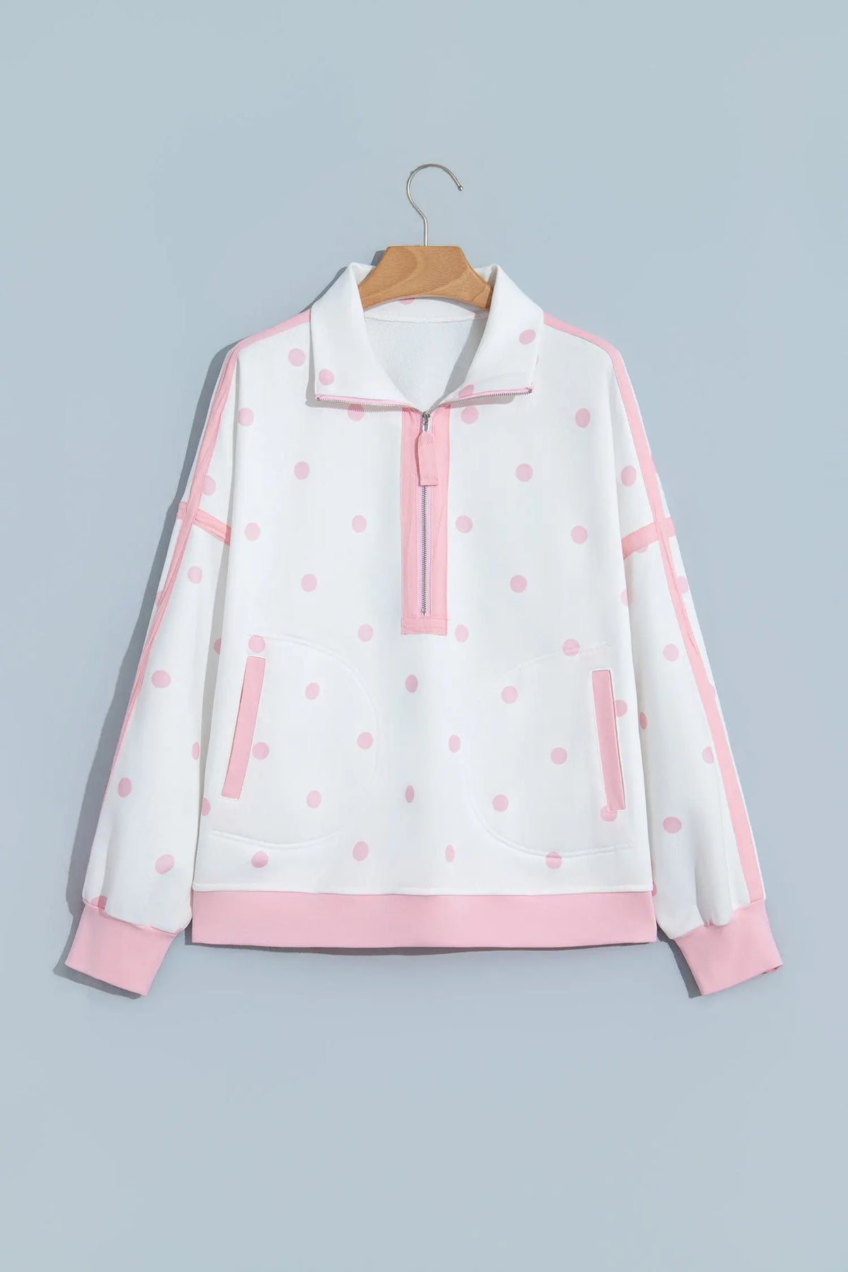 Pink Polka Dot Half Zip Drop Shoulder Relaxed Sweatshirt hanging view · nz-alt-v1