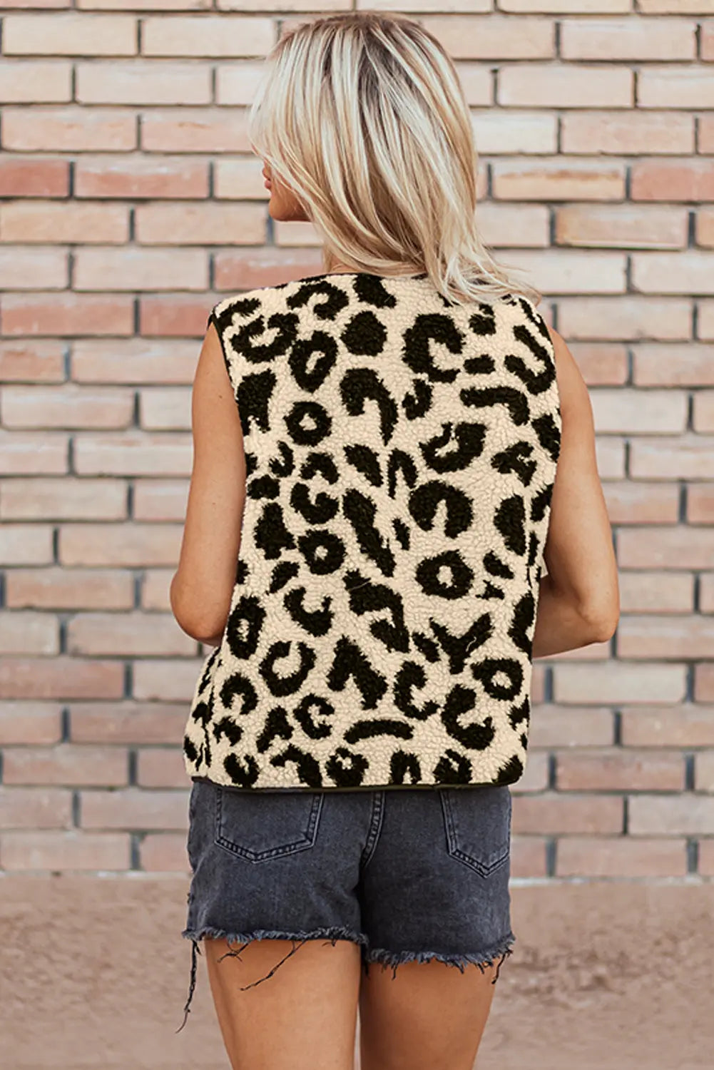 Cream leopard print sherpa vest coat, model back view · nz-alt-v1