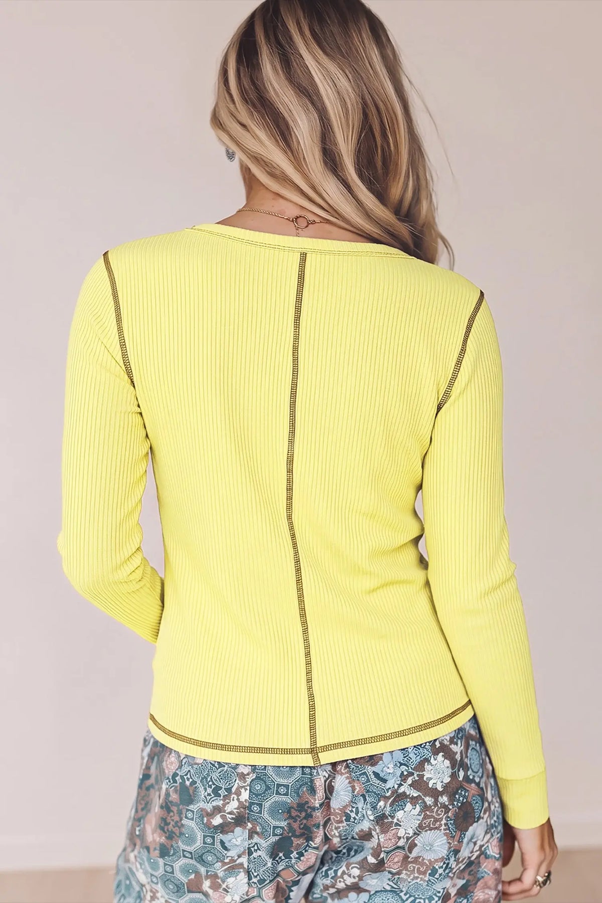 V neck ribbed stitched detail long sleeve top banana cream model back view · nz-alt-v1