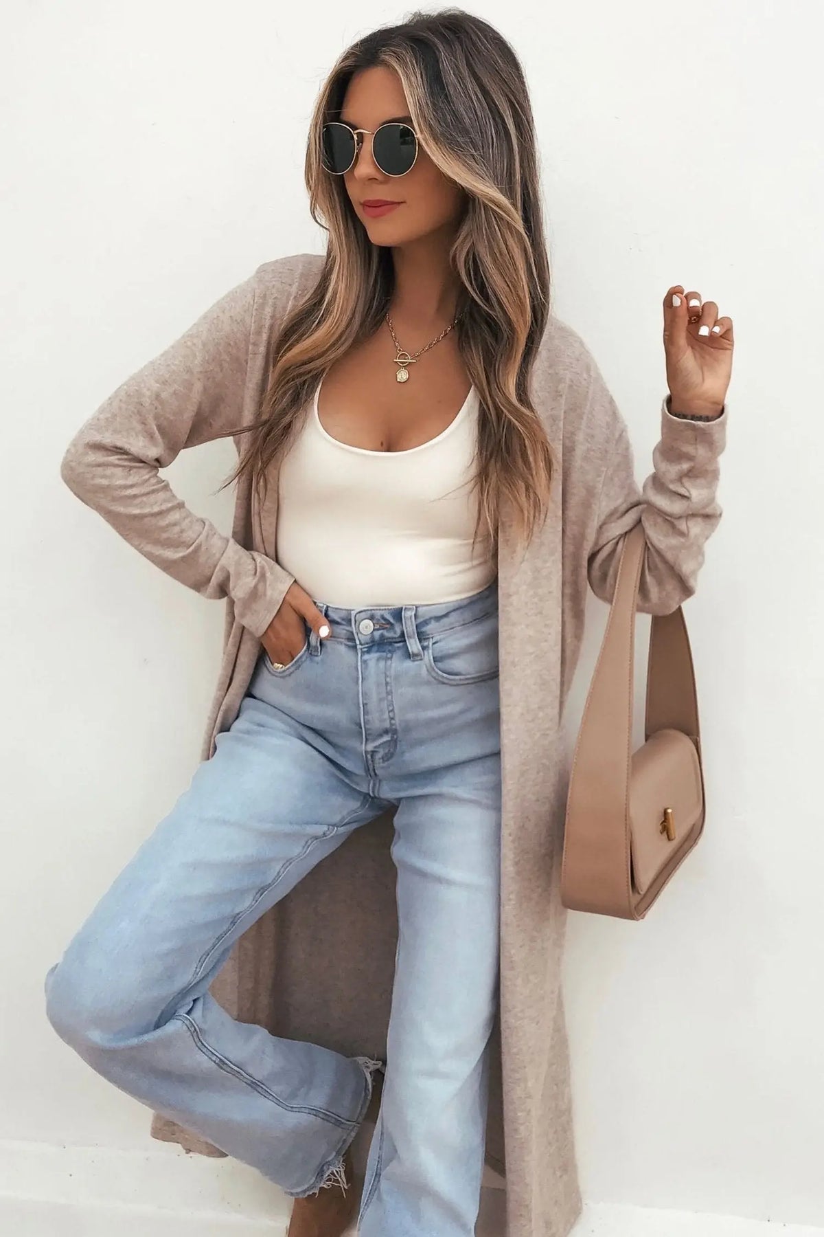 Solid color long sleeve casual tunic shift cardigan parchment model front view · nz-alt-v1