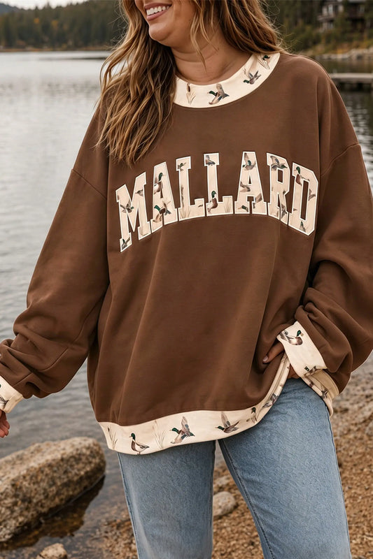 Coffee Plus Size Embroidered Trim Mallard Patch Contrast Trim Crewneck Sweatshirt model front view · nz-alt-v1