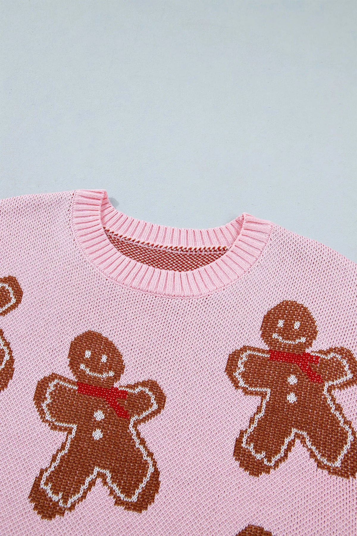 Pink Gingerbread Pattern Round Neck Long Sleeve Shift Sweater neckline detail view · nz-alt-v1