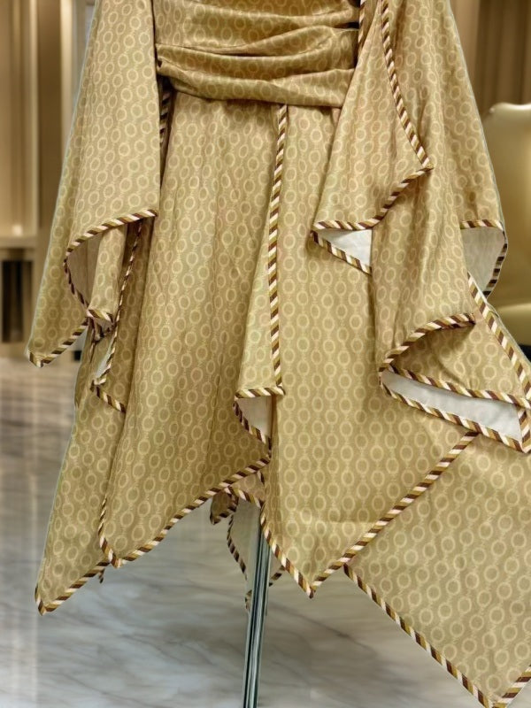 Golden Cutout Handkerchief Hem Maxi Dress detail view · nz-bg-v1