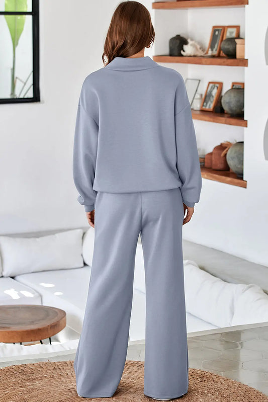 Dusk Blue solid color cowl neck drawstring pullover wide leg athleisure pants set model back view · nz-alt-v1