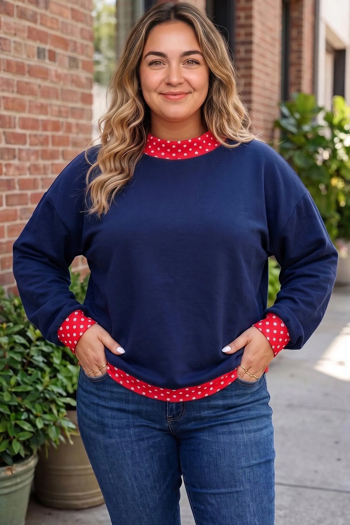 Polka dot patchwork round neck plus size sweatshirt dirty blue model front view · nz-alt-v1
