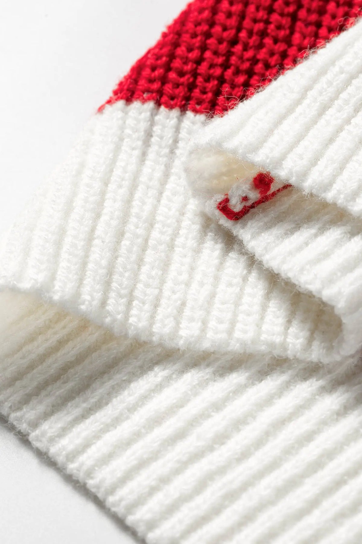 Red Stripe Striped Colorblock V Neck Long Sleeve Shift Sweater cuff detail view · nz-alt-v1