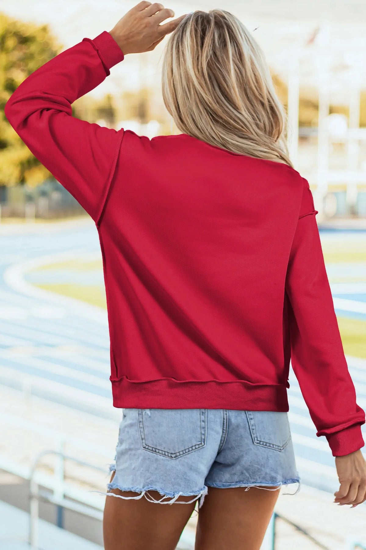 Fiery Red Frayed Applique Christmas Tree Mock Neck Pullover Sweatshirt model back view · nz-alt-v1