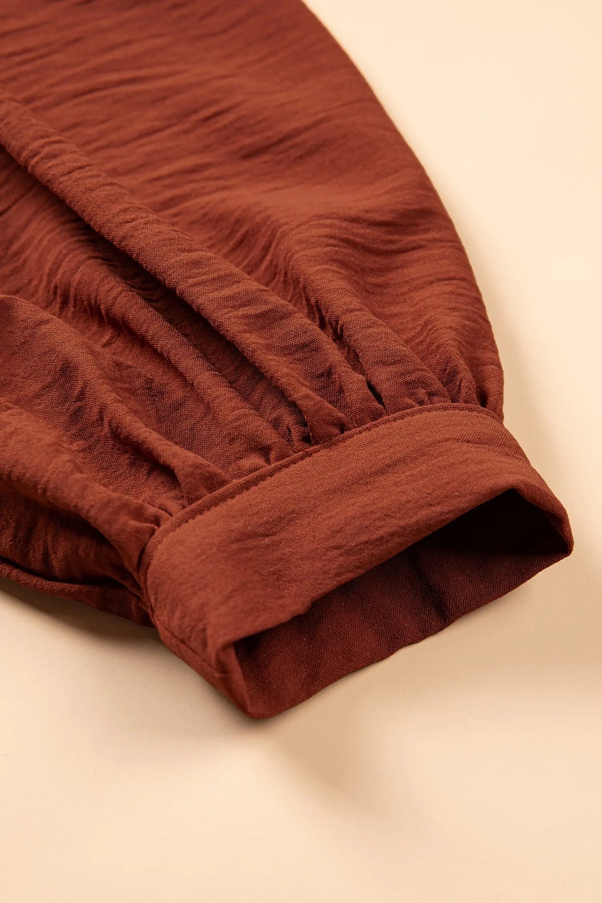 Coffee solid shift long sleeve short length one piece dress detail view · nz-alt-v1