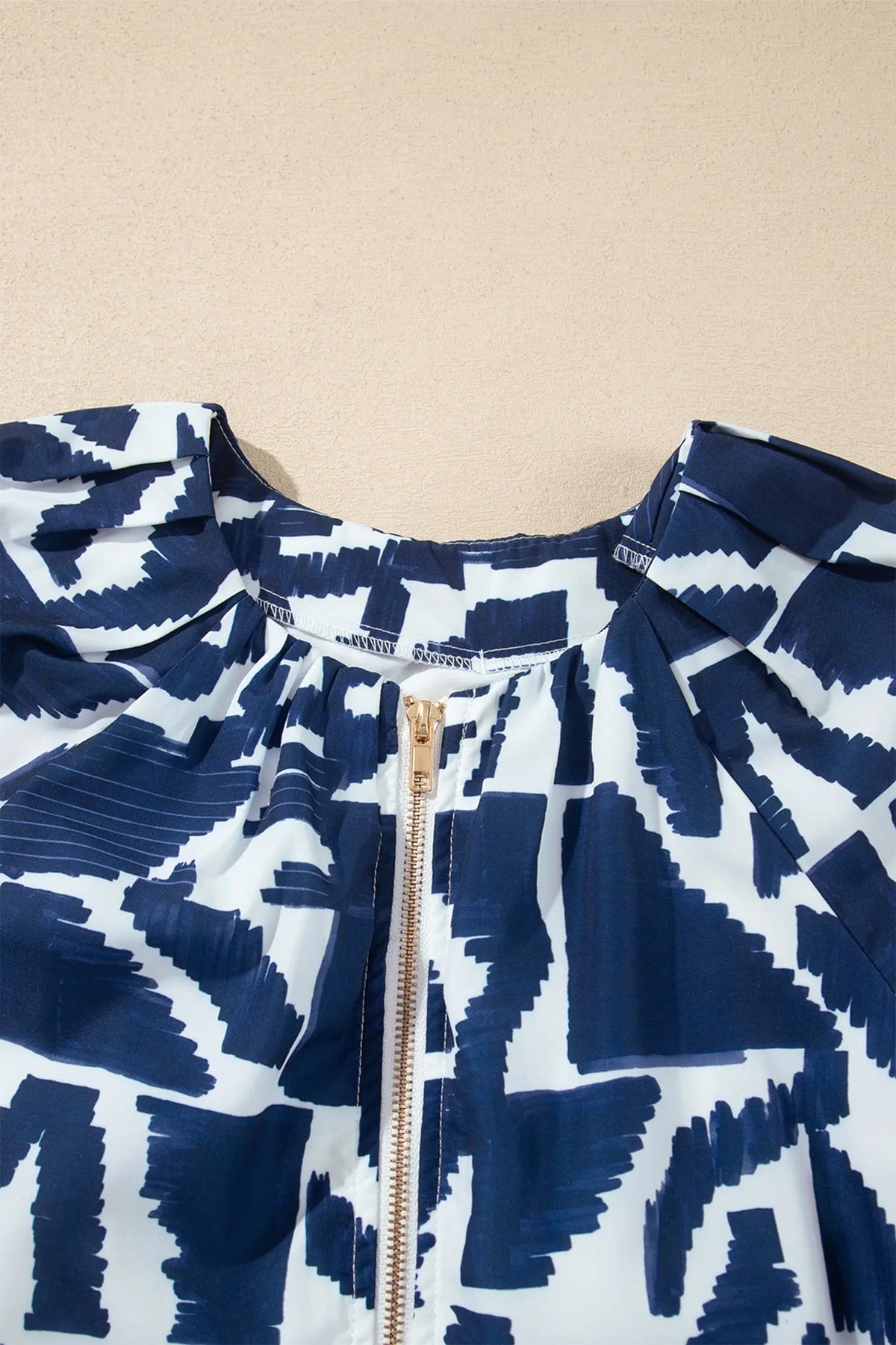 Blue Abstract Geometric Print Zip Front Tie Waist Shift Dress neckline zipper detail view · nz-alt-v1