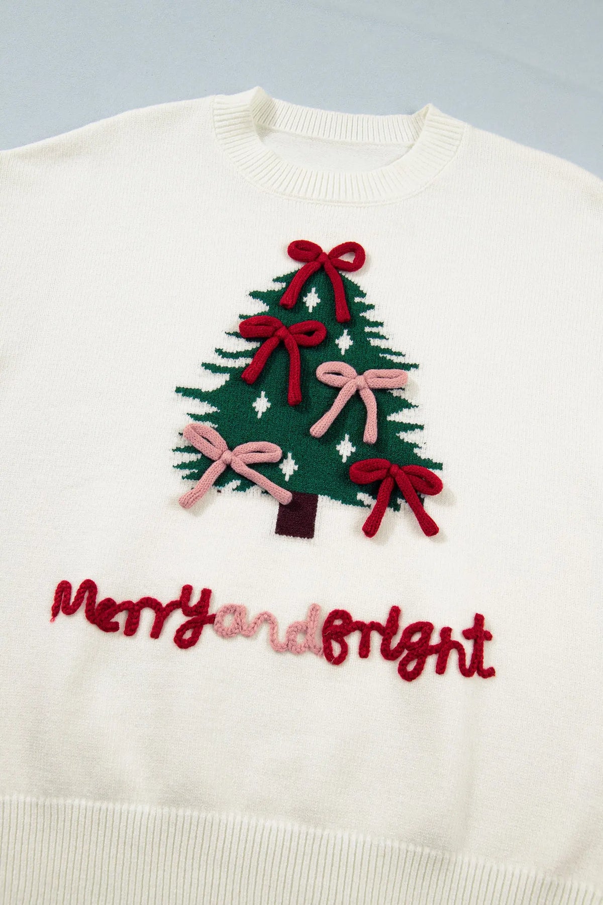 White Christmas Tree Bow Drop Shoulder Knit Sweater detail view · nz-alt-v1