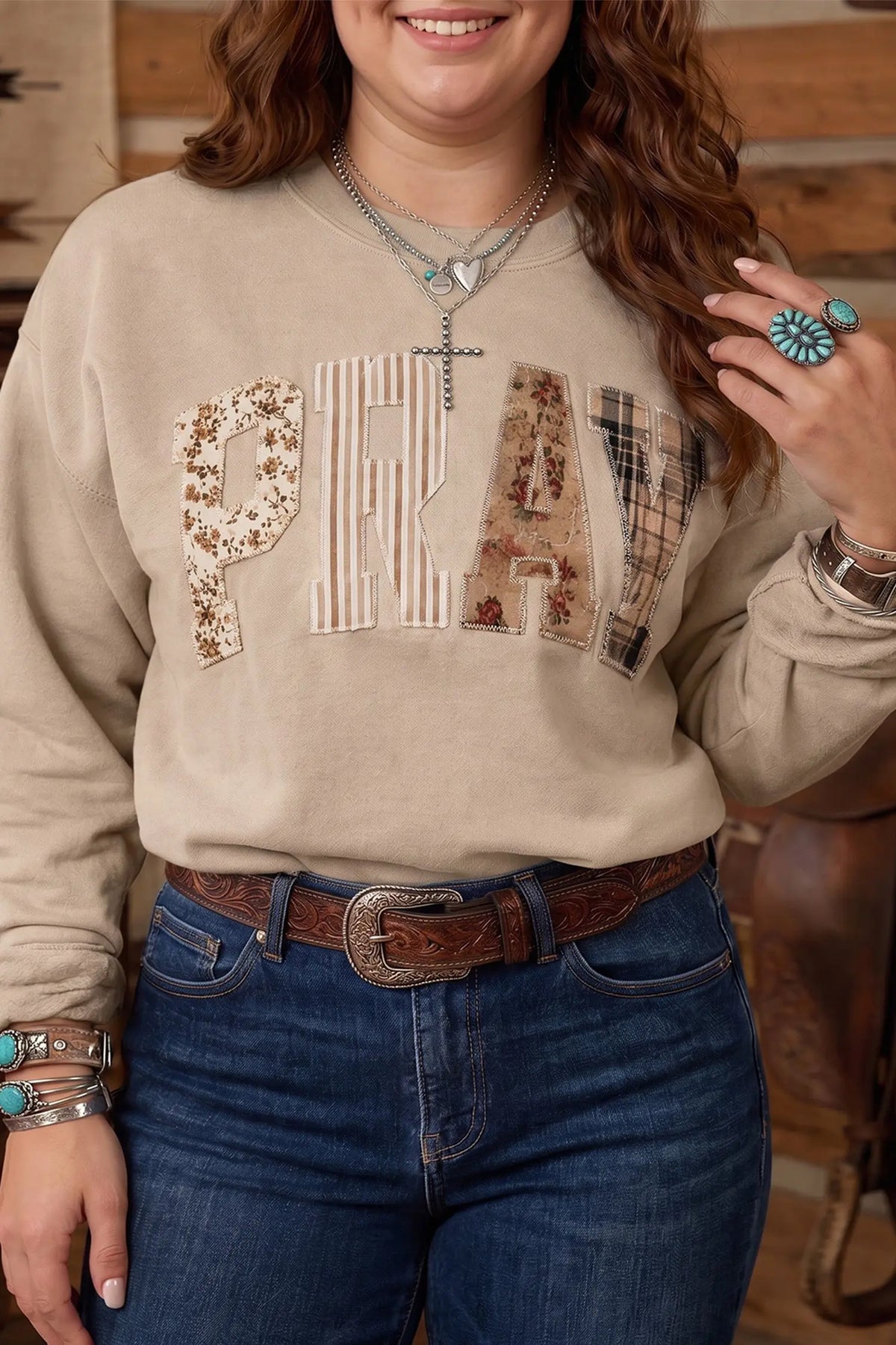 Parchment PRAY letter patchwork round neck plus size sweatshirt model front view · nz-alt-v1