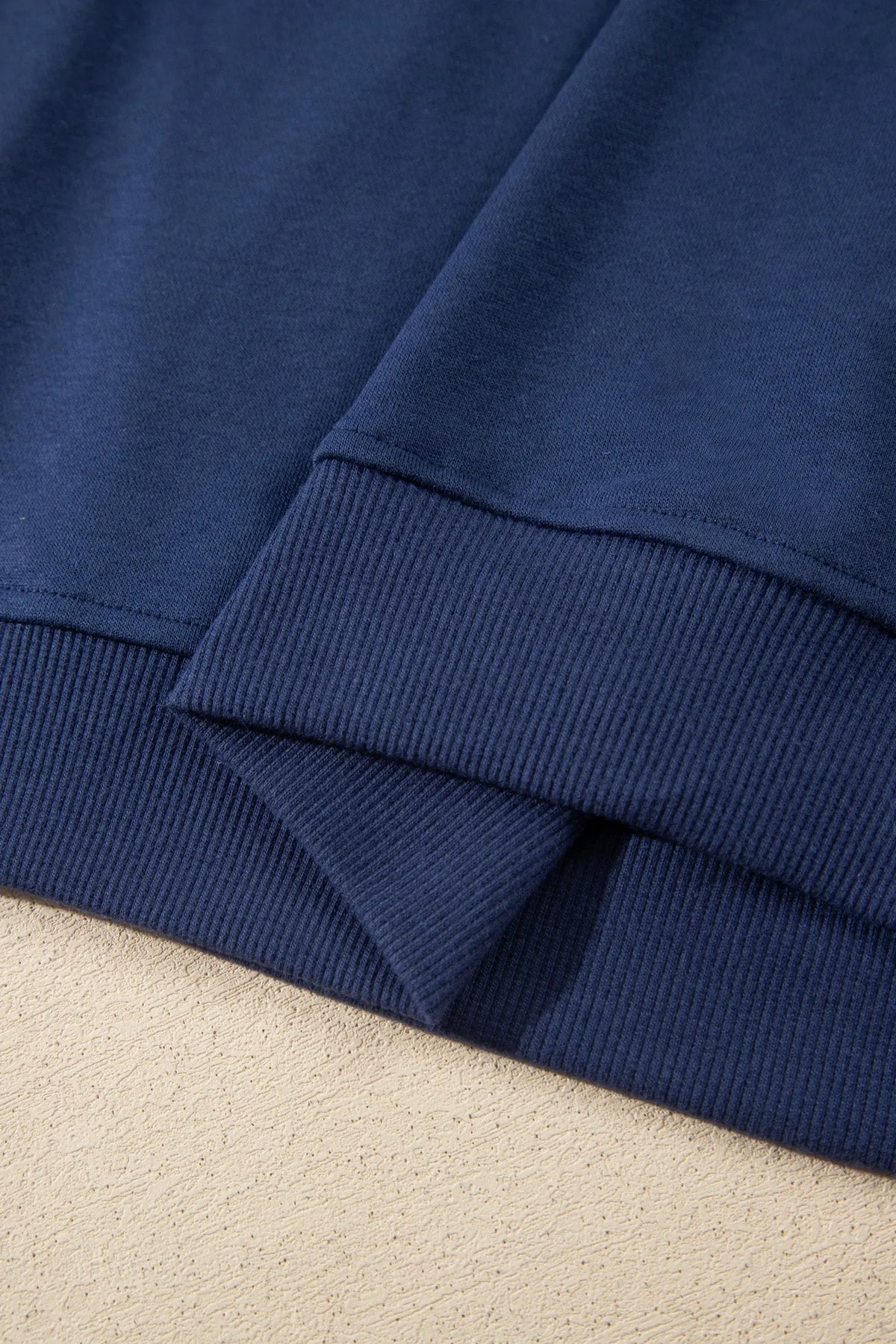 Navy blue long sleeve zip-up top elastic waist skort set detail view · nz-alt-v1