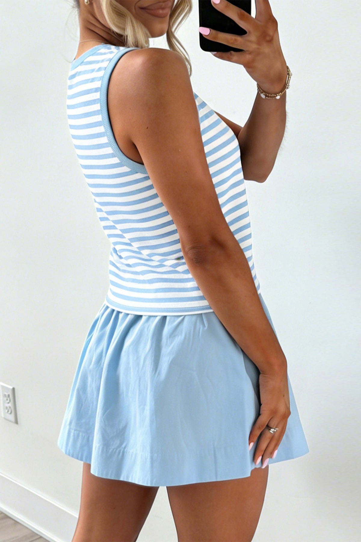 Sky blue stripe slim tank and ruffle mini skort set model side back view