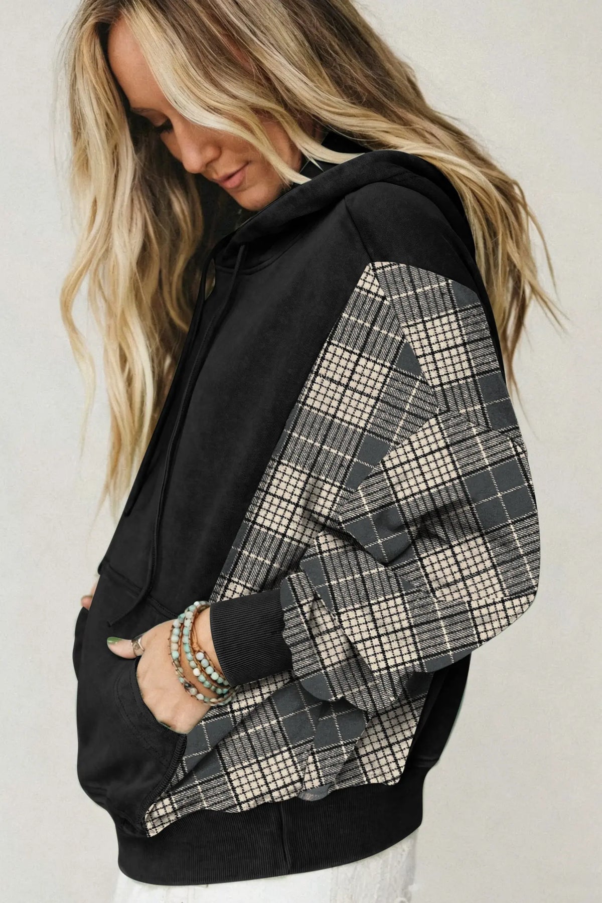Black plaid sleeve drawstring pocket hooded sweatshirt side view · nz-alt-v1