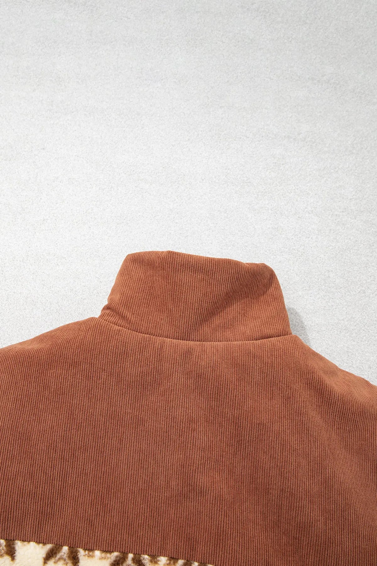 Brown geometric print fleece zipper collar vest collar detail view · nz-alt-v1