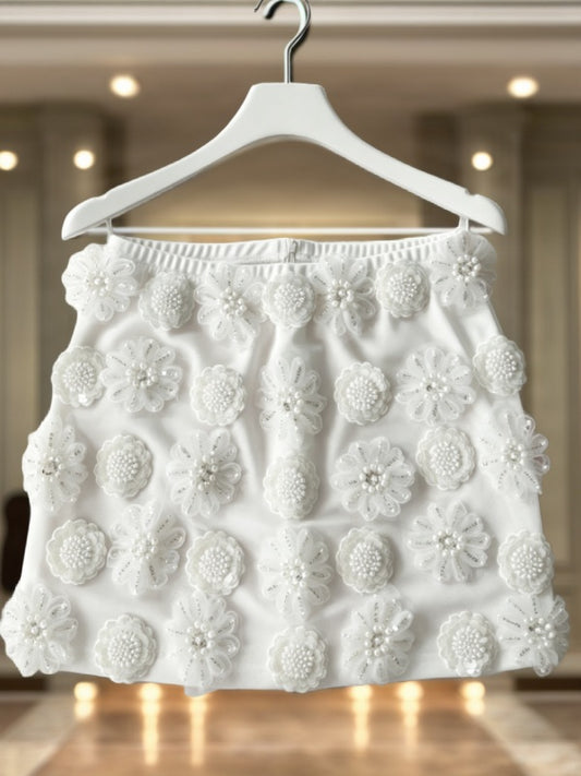 3D Floral Beaded Mini Skirt in White hanging view · nz-bg-v1