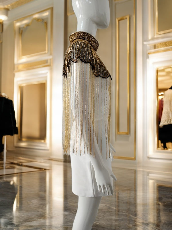 Ivory Mini Dress with Gold Beaded Fringe Capelet side view · nz-bg-v1