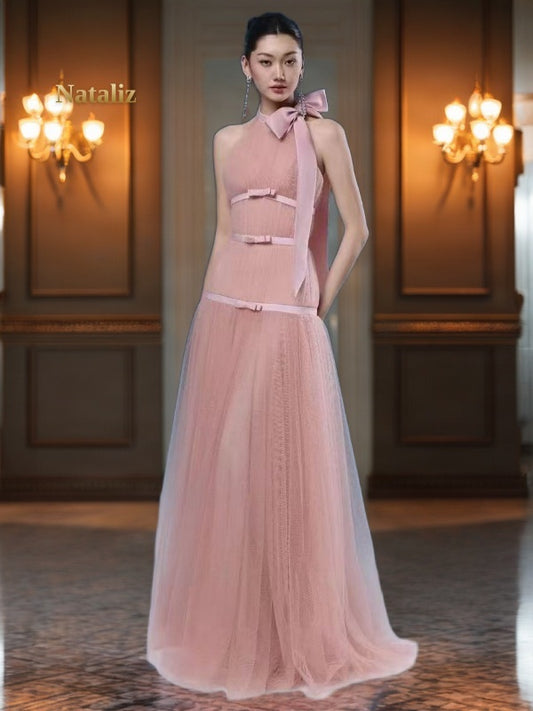 Blush Pink Halter Bow Maxi Gown model front view