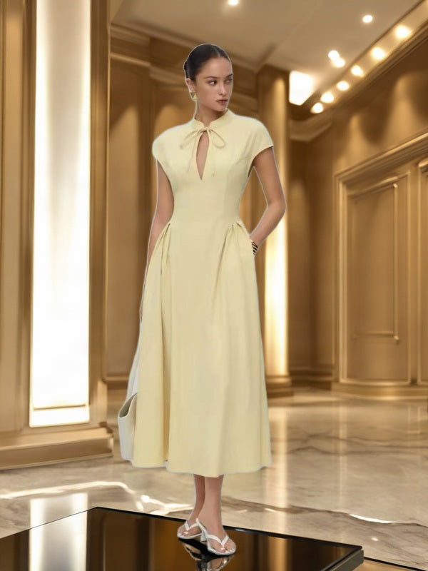 Bow Neck Cap Sleeve Midi Dress in Butter Yellow model front view · nz-bg-v1