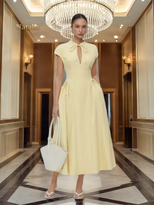 Bow Neck Cap Sleeve Midi Dress in Butter Yellow model front view