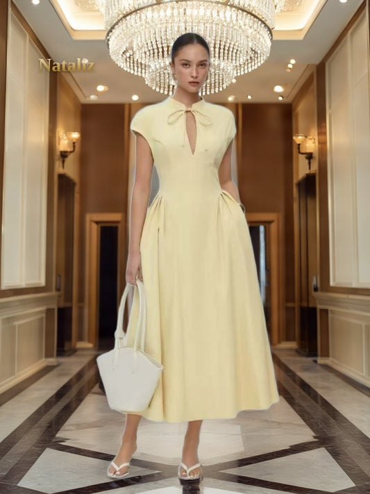 Bow Neck Cap Sleeve Midi Dress in Butter Yellow model front view