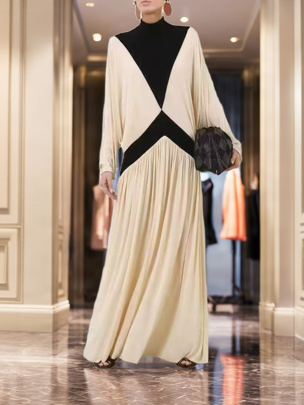 Colourblock Mock Neck Batwing Maxi Dress model front view · nz-bg-v1