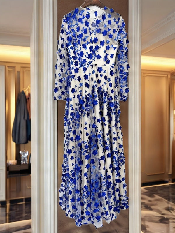 Cobalt Floral Appliqué Illusion Long Sleeve Gown hanging view · nz-bg-v1