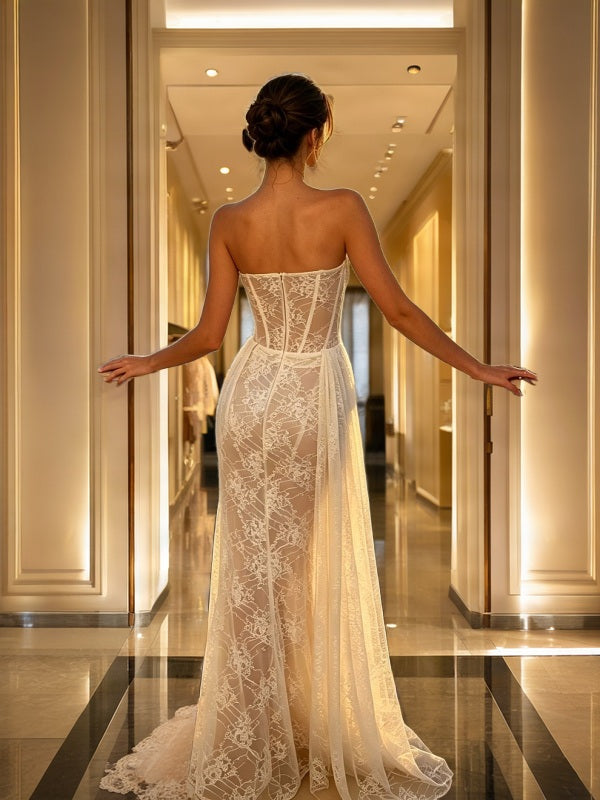 Strapless Sheer Lace Corset Maxi Gown with Draped Sash model back view · nz-bg-v1