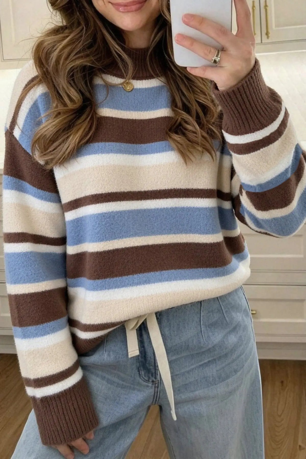 Brown stripe dropped shoulder pullover sweater model front view · nz-alt-v1