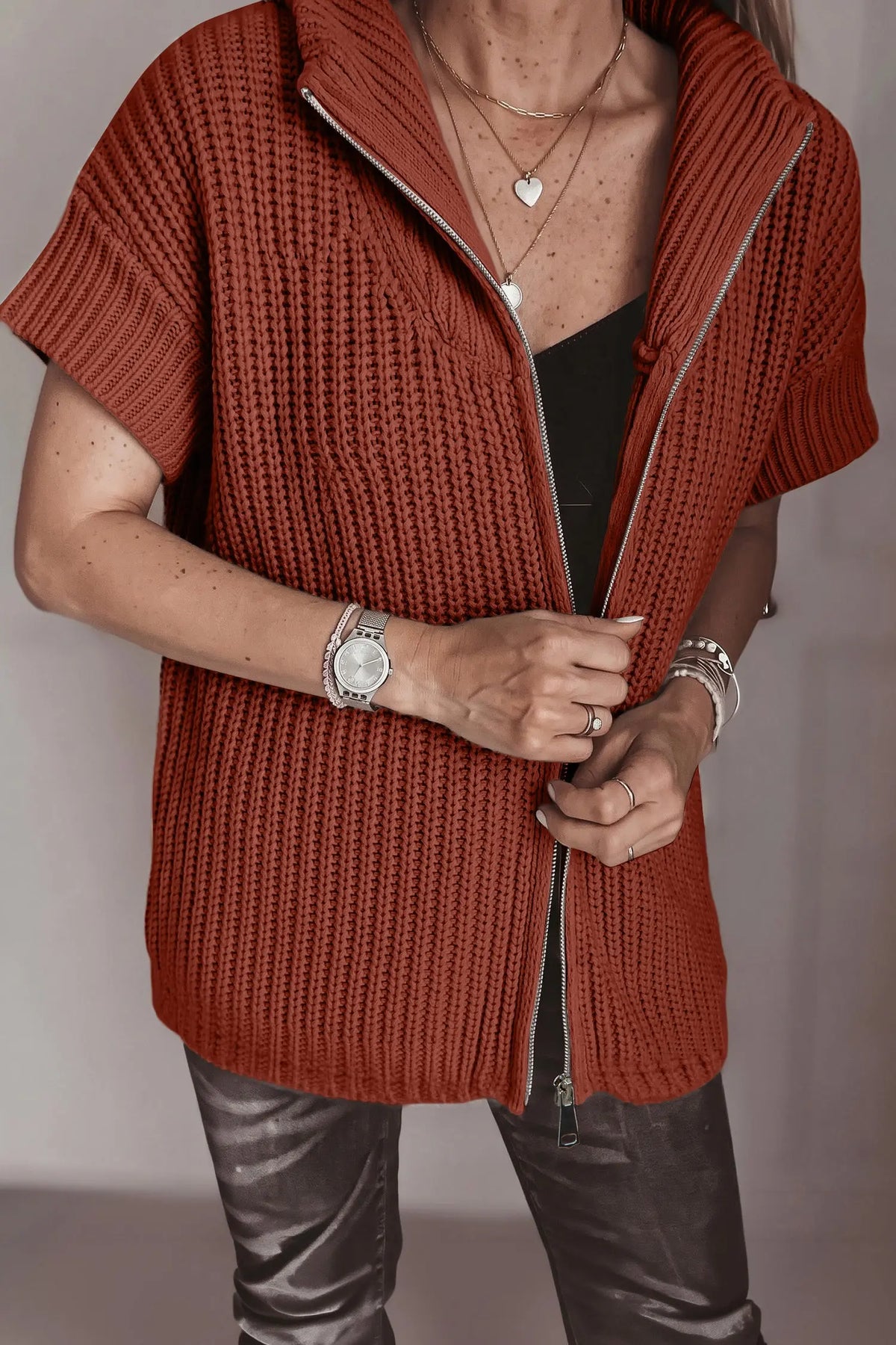 Cinnamon short sleeve zipper knit high neck sweater worn open, model front view · nz-alt-v1