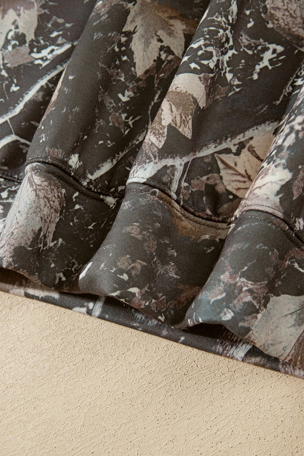 Multicolour camouflage Jesus Loves You print relaxed hoodie fabric detail view · nz-alt-v1