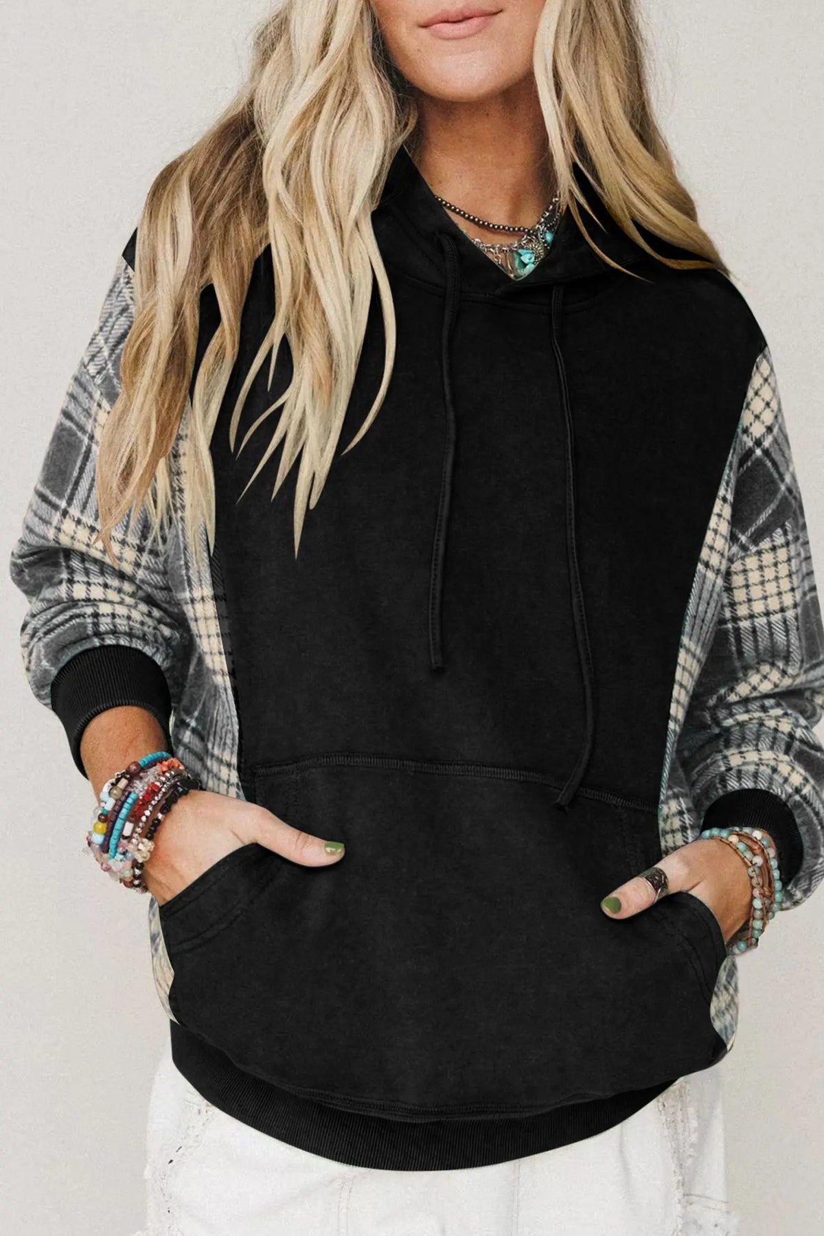 Black plaid sleeve drawstring pocket hooded sweatshirt model front view · nz-alt-v1