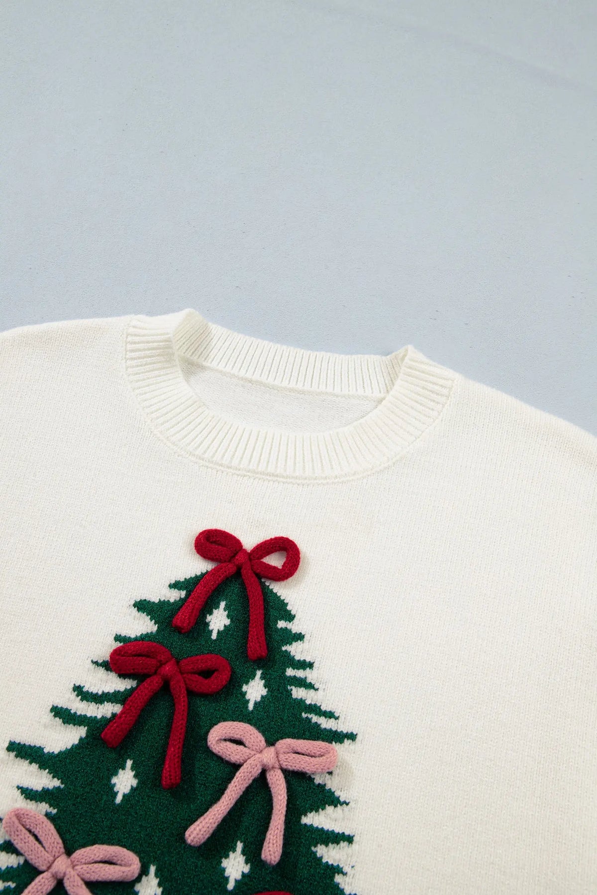 White Christmas Tree Bow Drop Shoulder Knit Sweater detail view · nz-alt-v1