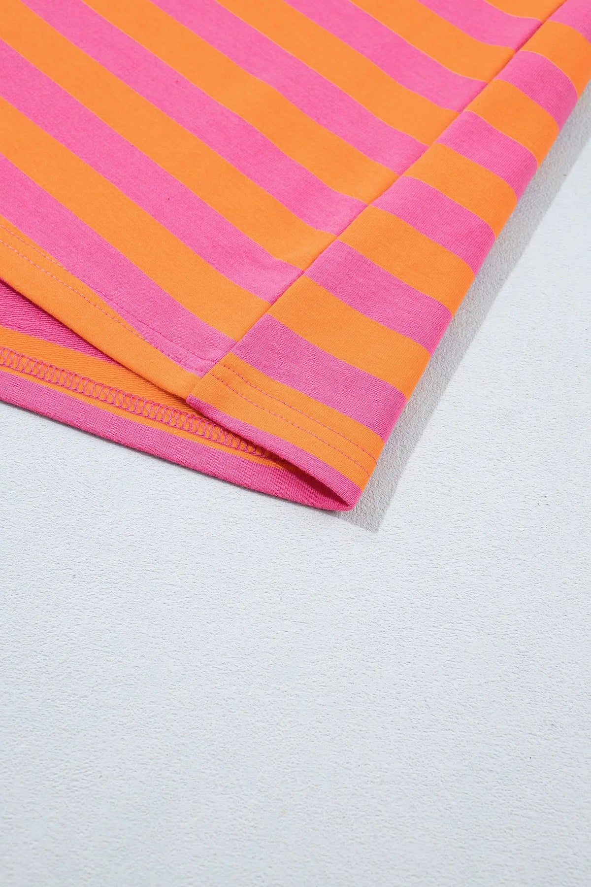 Orange stripe color block patchwork mock neck pullover drawstring mini skort set detail view · nz-alt-v1