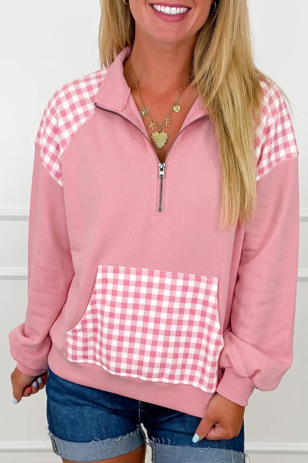Patchwork Plaid Pocket Quarter Zip Sweatshirt pink model front view · nz-alt-v1