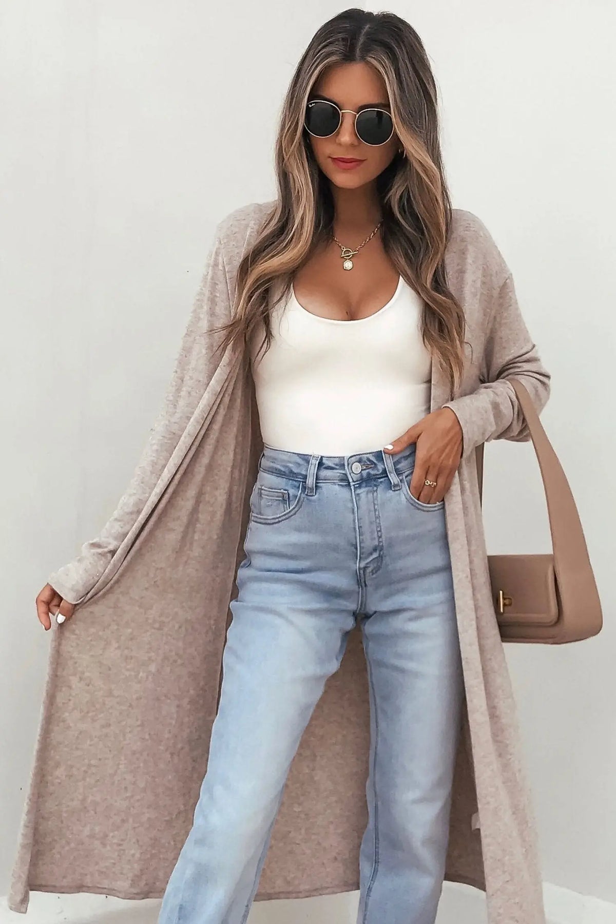 Solid color long sleeve casual tunic shift cardigan parchment model front view · nz-alt-v1