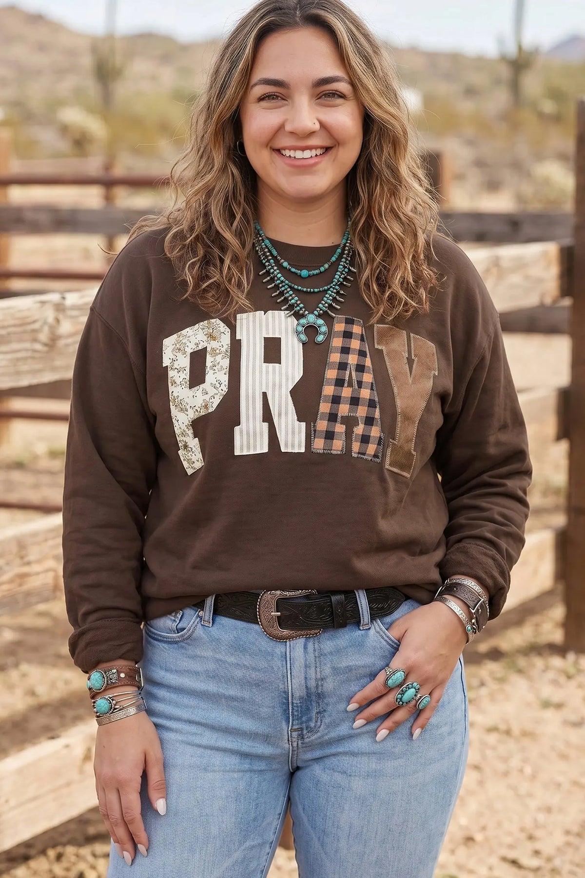 PRAY letter patchwork round neck plus size sweatshirt coffee brown model front view · nz-alt-v1