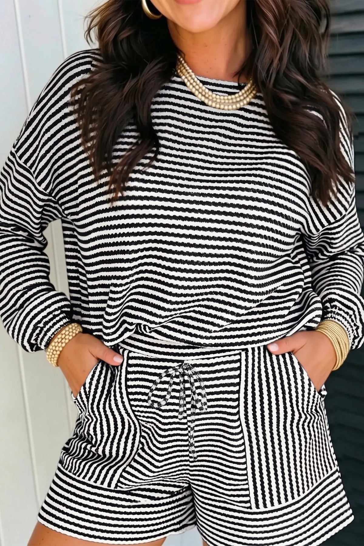 Stripe textured knit long sleeve top and elastic waist shorts set black model front view · nz-alt-v1