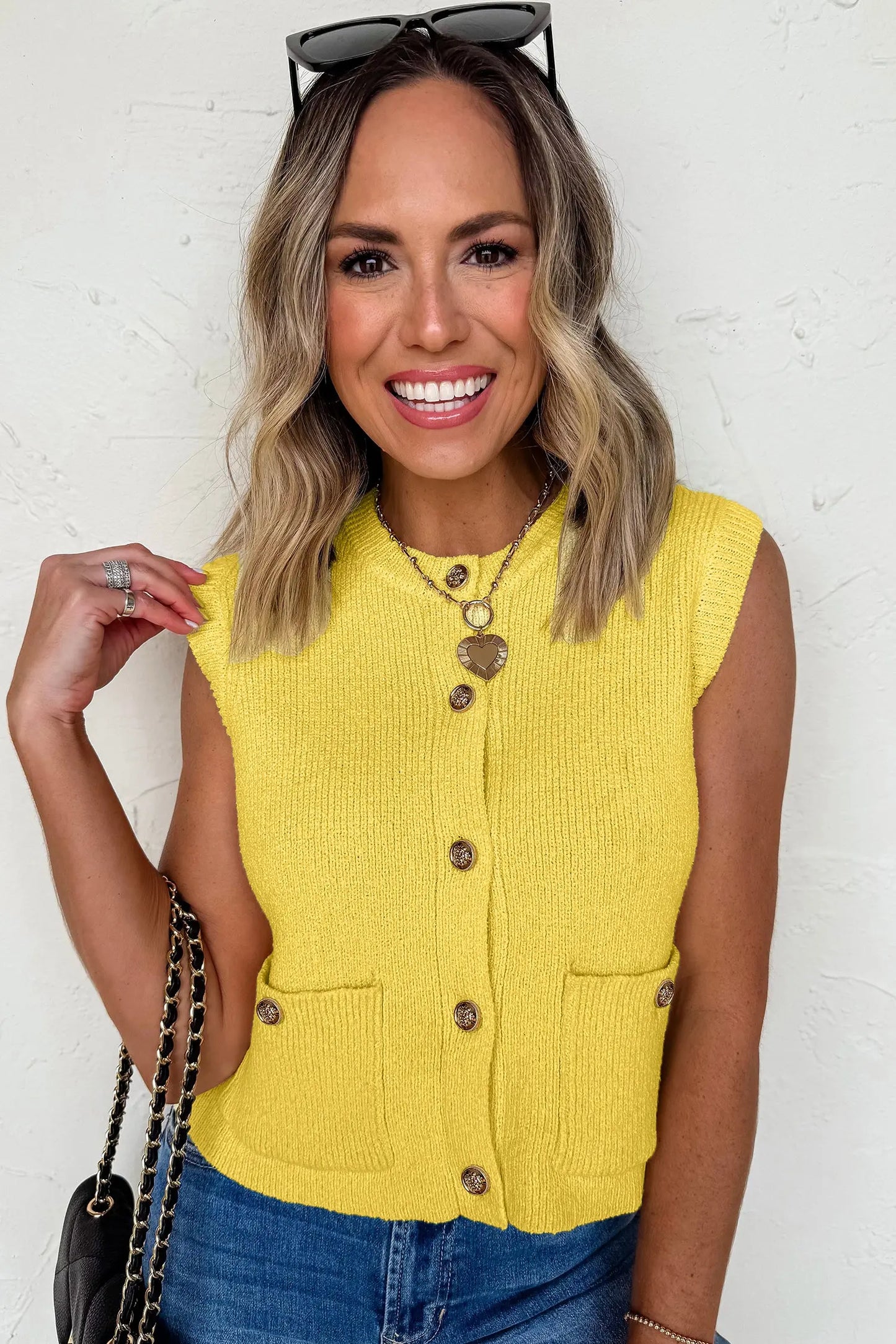White Solid Color Sleeveless Knit Button Pocketed Sweater Nataliz