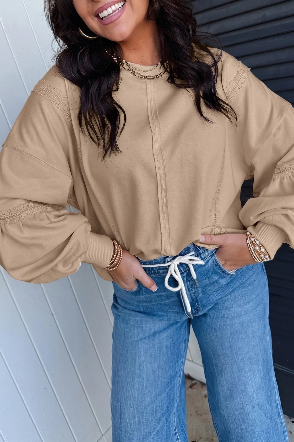 Parchment Solid Color Raw Seam Lace Detail Loose Casual Sweatshirt model front view · nz-alt-v1