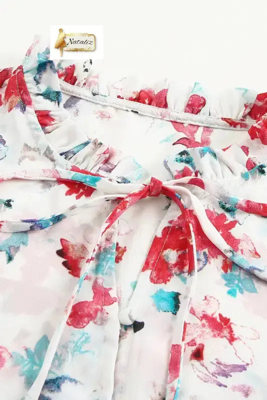 Blue Cakewalk Floral Smocked Blouse Nataliz