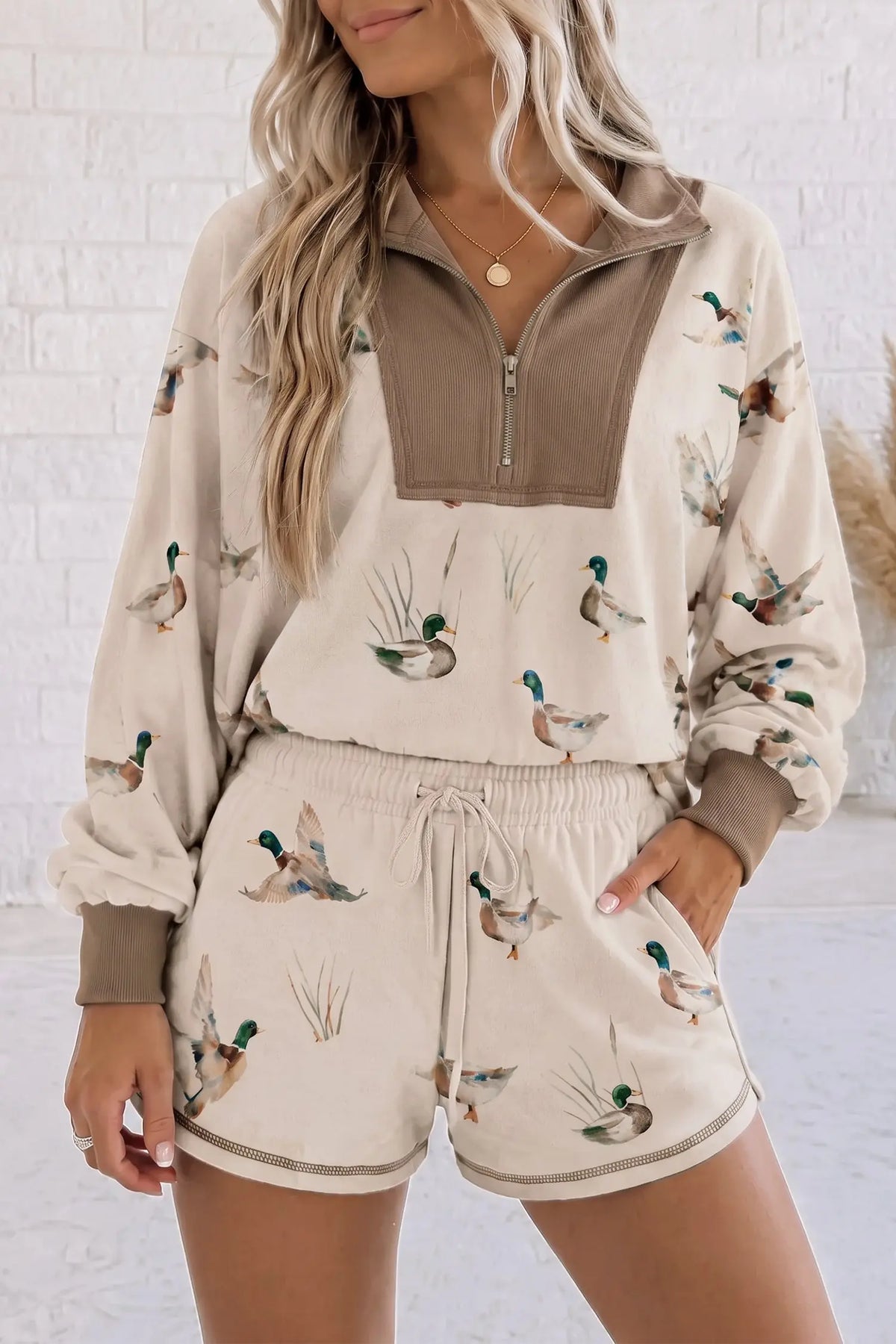Khaki mallard print color block zip pullover and shorts set, model front view · nz-alt-v1
